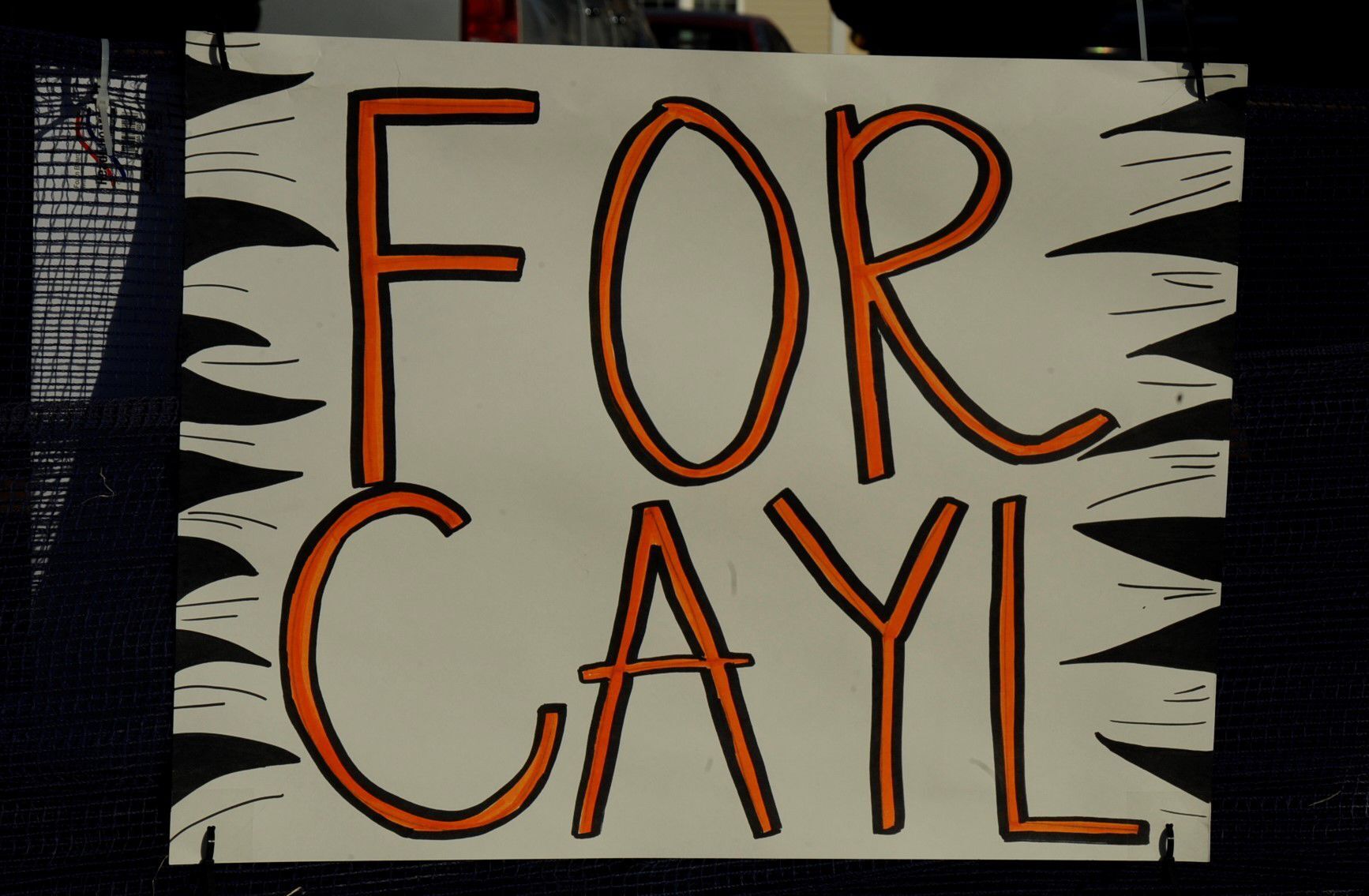 "For Cayl" sign